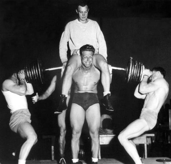 Leo Stern doing a heavy support lift with 885 pounds in 1944 Co-author Kim - photo 3