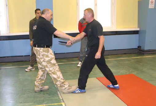 The author teaching unarmed combat to some interesting characters at the Vienna - photo 5