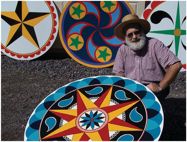 Ivan E Hoyt displays several of his hex signs I have been painting hex signs - photo 4