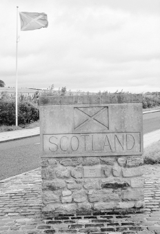 The EnglishScottish border marked by stone and flag beside the north bound - photo 2