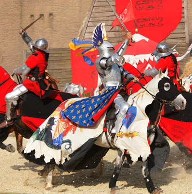 A medieval combat with knights on horses at the Grand Parc Puy du Fou lt - photo 7