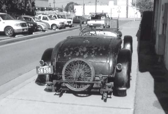 The body still retains the charcoal paint and silver moldings that were sprayed - photo 4