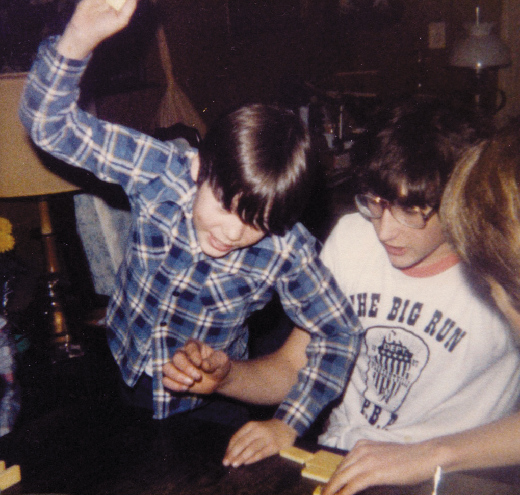 Here I am with my cousin playing dominoes Well I wasnt actually playing but - photo 8