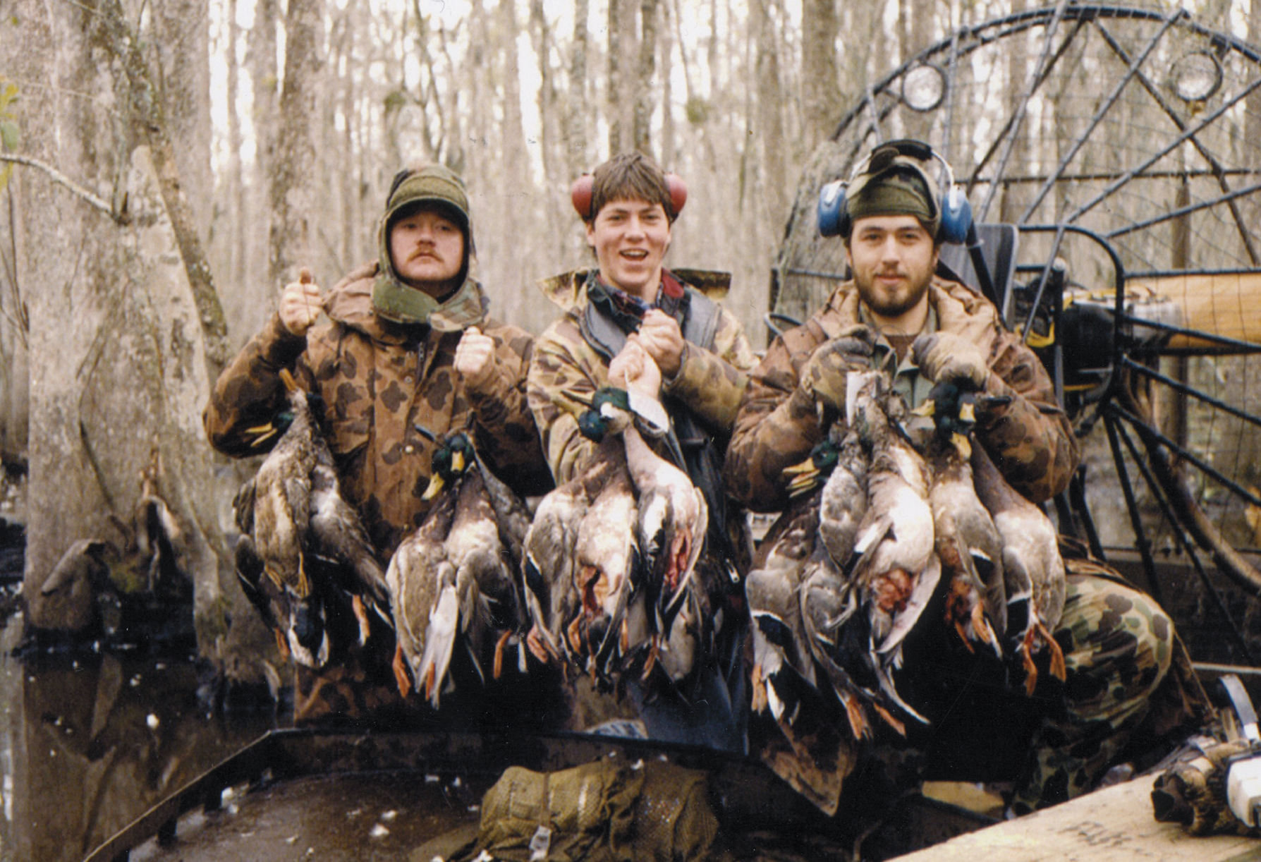 The guys out on an air boat in the winter of 1987 Thats me in the middle with - photo 13