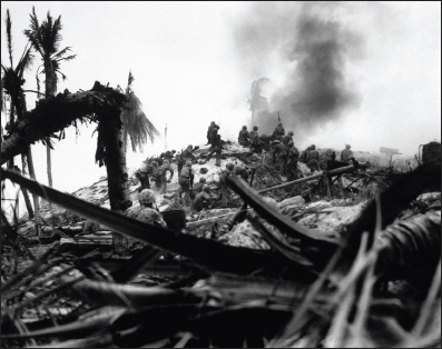 Marine demolition teams storm a Japanese stronghold on Betio Island in the - photo 4