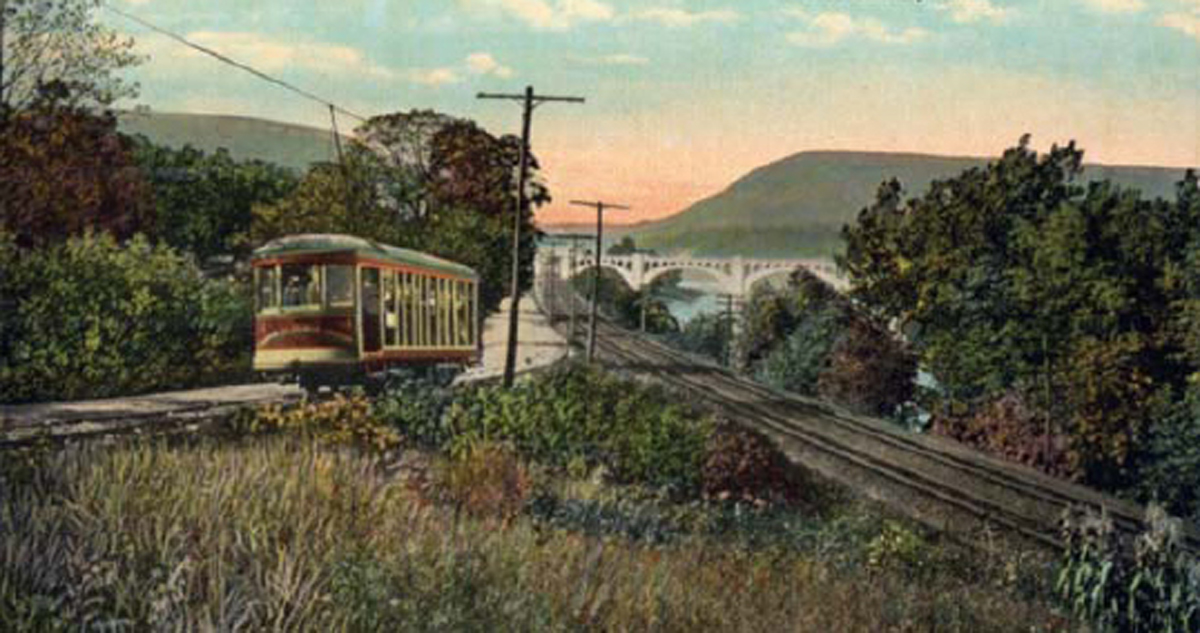 An interurban electric car runs along the roadside at the Delaware Water Gap - photo 6