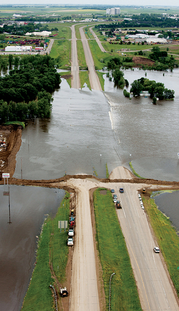 Flooding from the Souris River breaches a highway in North Dakota GET READY - photo 5