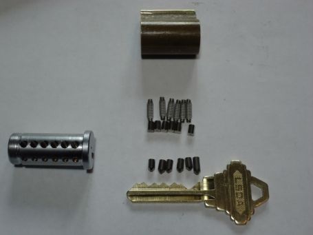 Figure 1 - Unassembled key-in-knob commercial cylinder So what do we have in - photo 1