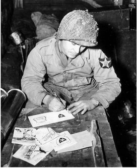 With Christmas approaching a private of the 2nd Infantry Division rests on a - photo 5