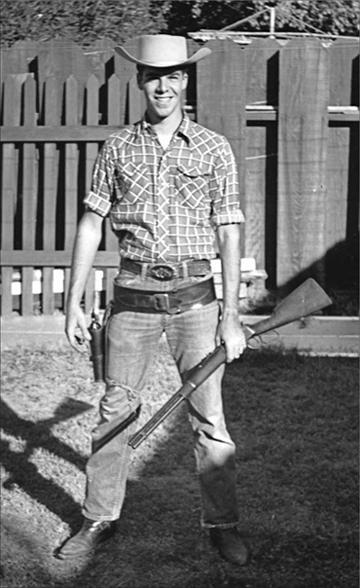 In this photo from the 1950s the author proudly poses with his first Colt - photo 3