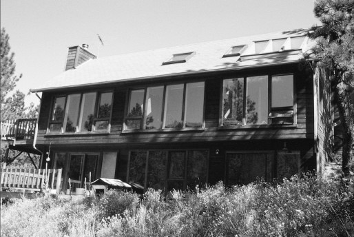 FIGURE I-1 The authors first passive solar house offered numerous solar - photo 2