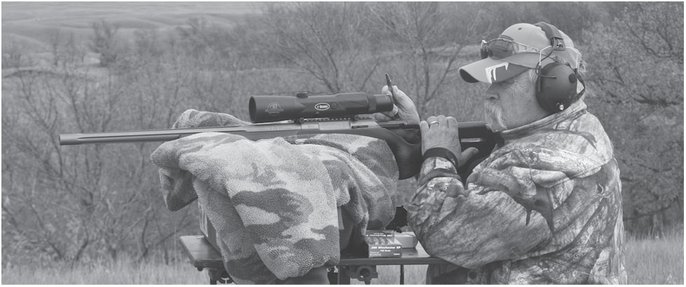 The author at the shooting bench with a TC sniper rifle in 308 Win 762mm - photo 7