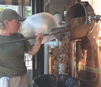 Brewing is hard work Removing the spent grain from the mash tun or graining - photo 6