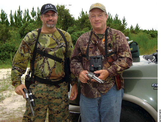 JOHN PARKER AND THE AUTHOR on a hog hunt in Florida Parker is packing the very - photo 2