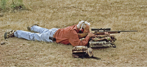 Friend Sid Johnson checking out his Al Lind-made custom rifle before heading - photo 4