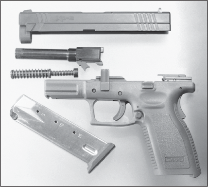 Springfield XD field-stripped Detail Strip A roll-pin drift punch is the - photo 7