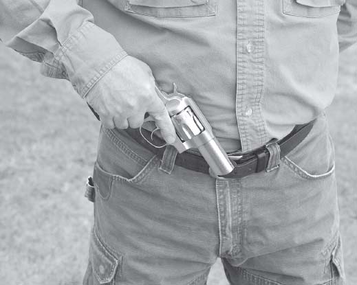 Twist the gun clockwise into a natural position bring the cylinder into - photo 11