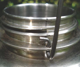 The bail slides through the holes drilled in the lower rim of the Guyot bottle - photo 5