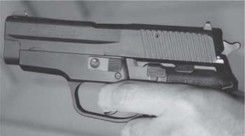 Its a stretch to call the SIG-Sauer southpaw-unfriendly and this book explains - photo 5