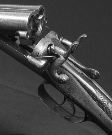 An early break-action hammer side-by-side shotgun by Holland Holland - photo 5