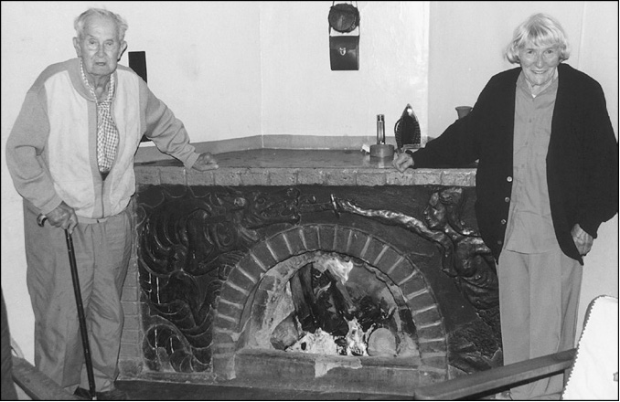 Fireplace in the Voigt home The concrete mural was carved by Werners father - photo 11