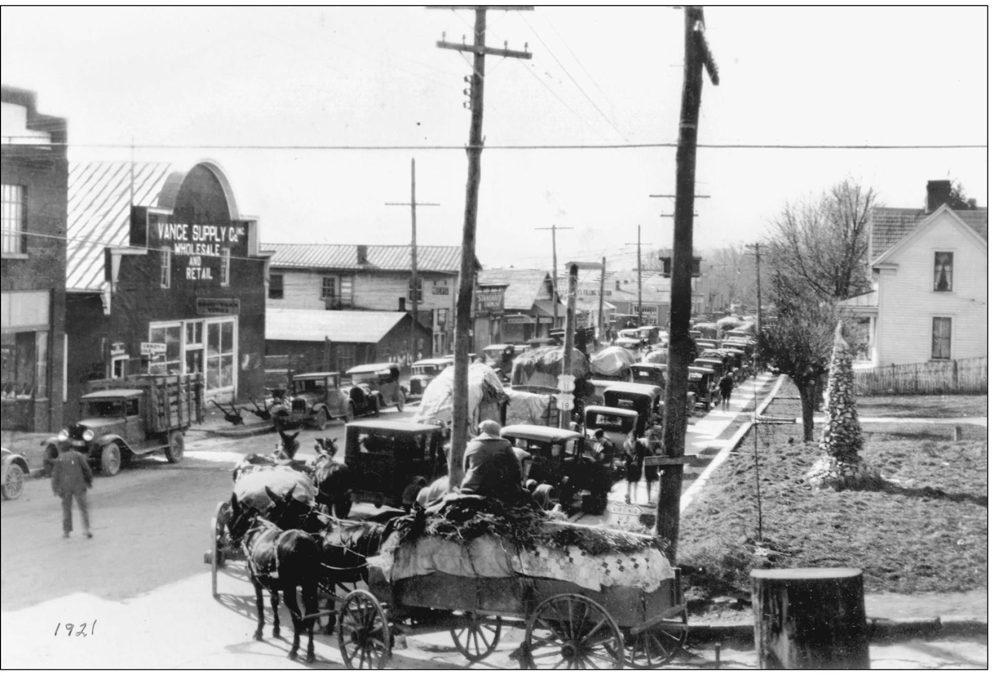 WAGONS LOADED WITH TOBACCO ON WEST MAIN STREET IN 1921 This view of West Main - photo 6