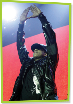 Image Credits AP ImagesMatt Sayles Jay-Z holds up his signature hand symbol - photo 3