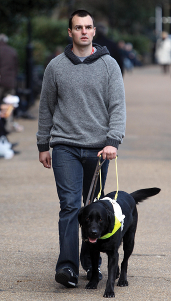 Image Credit Press Association via AP Images Some blind people use Seeing Eye - photo 5