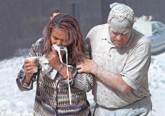 Image Credit Library of Congress A man covered with ashes aids a woman who is - photo 3