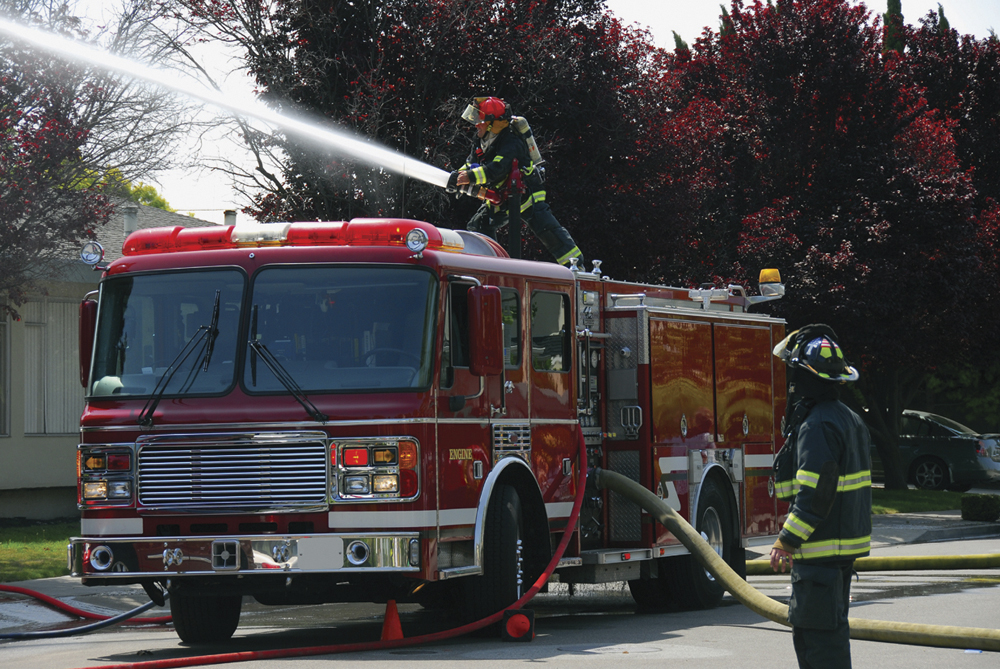 Image Credit Shutterstockcom Firefighters respond to a fire at an apartment - photo 2