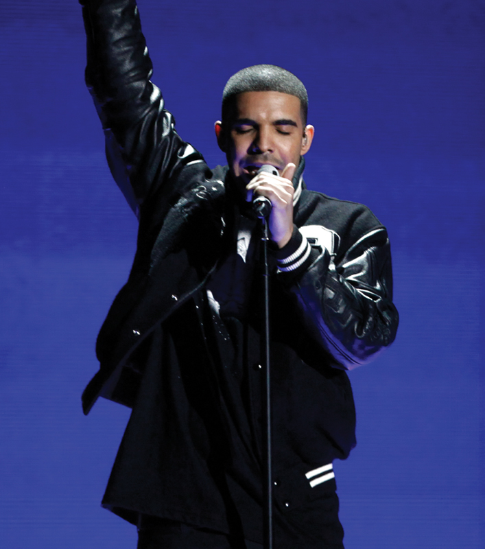 Image Credit AP PhotoMatt Sayles Drake gestures during a performance at the - photo 2
