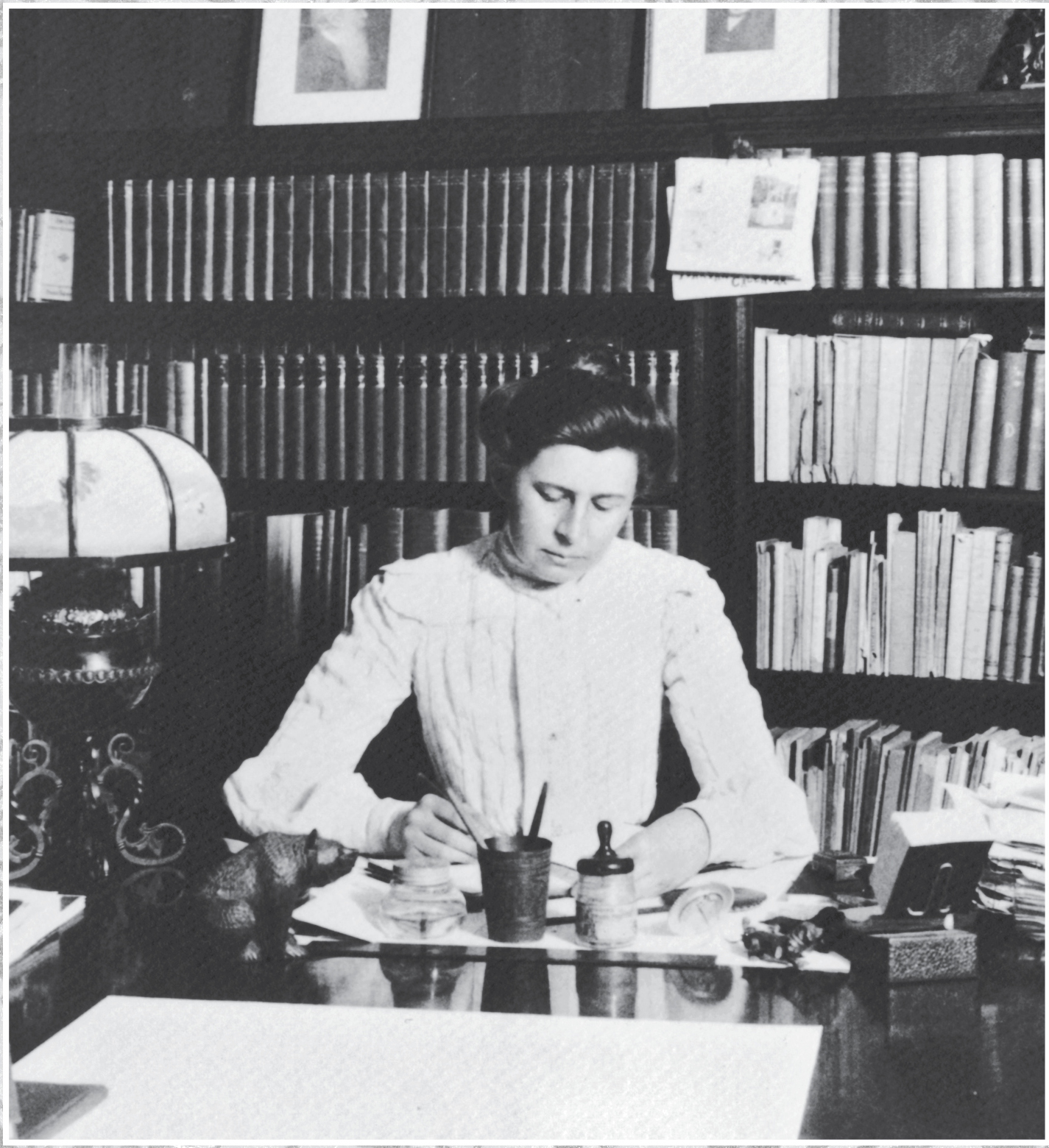 Ida M Tarbell in a posed photograph meant to show her at work on The History - photo 1