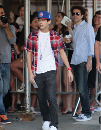 Austin greets fans outside New Yorks Z100 radio station in June 2012 Photo - photo 10