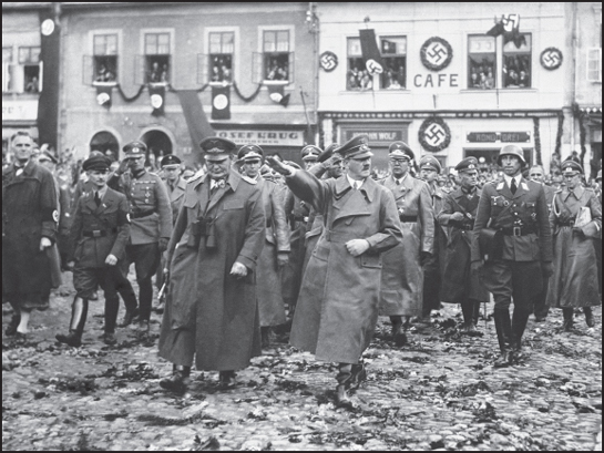 Image Credit Associated Press Adolf Hitler front right marches through the - photo 6