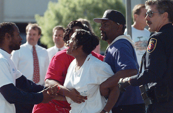 Image Credit AP Images David Longstreath Relatives and police console an - photo 4