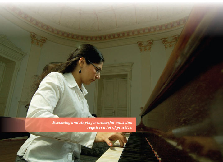 Tasha George-Hinnant runs through her finger exercises at the piano Scales - photo 2