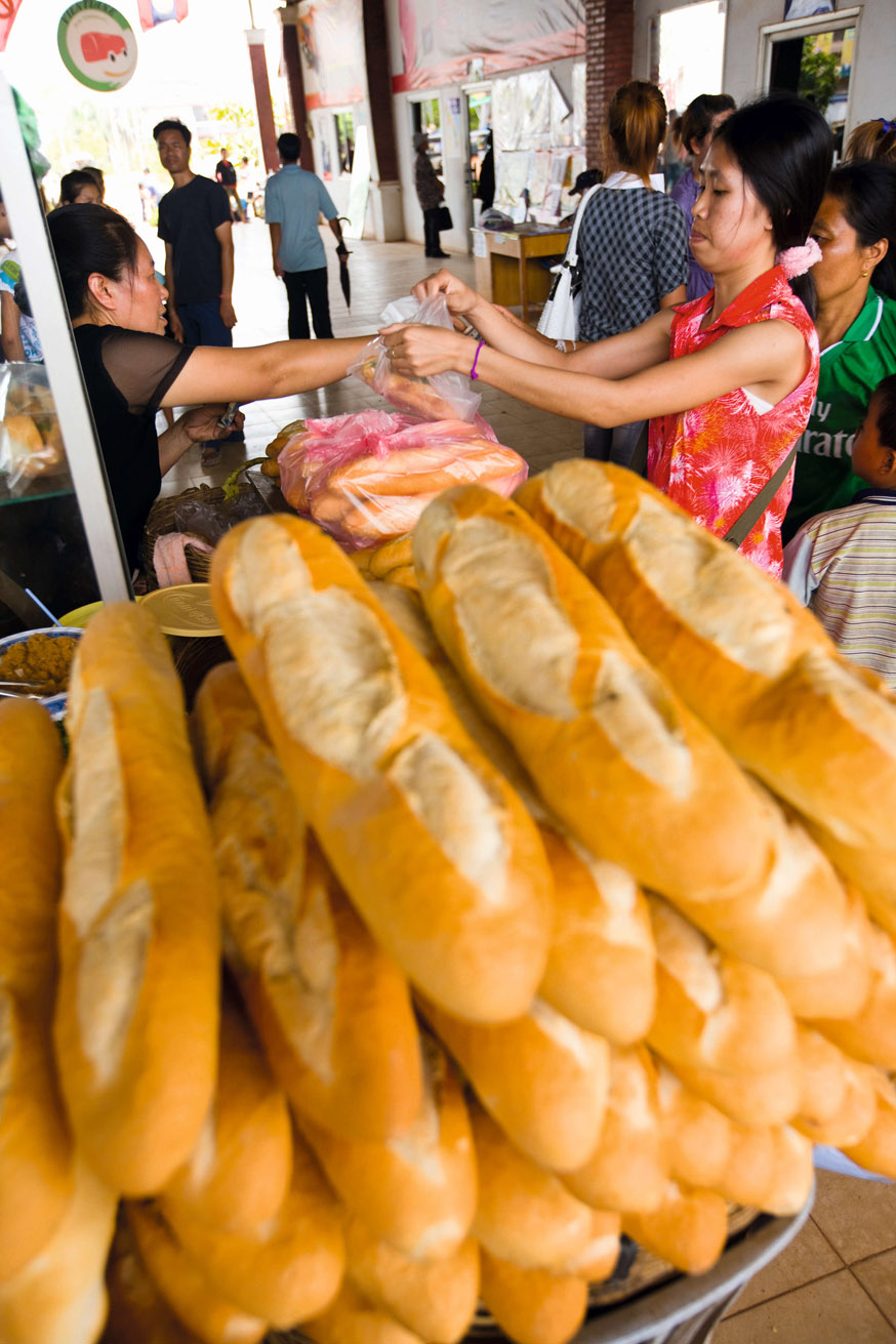Baguettes in Vientiane Peter StuckingsApa Publications Nowadays both have - photo 6