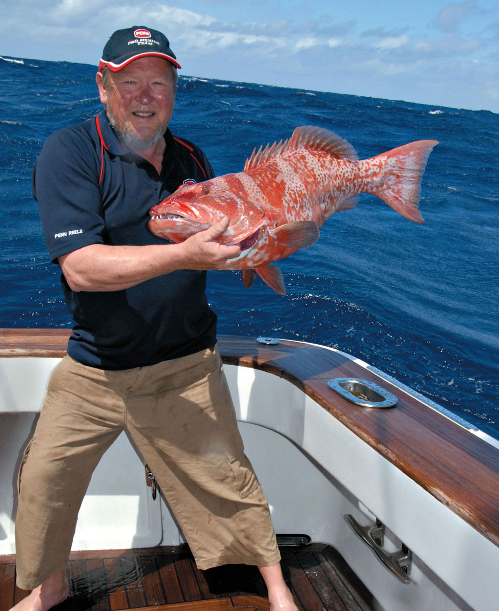 Steve Cooper with a coral trout he caught while jigging lures on a seamount - photo 4