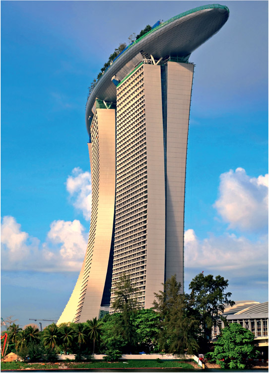 The iconic Marina Bay Sands features three luxury hotel towers connected by a - photo 7