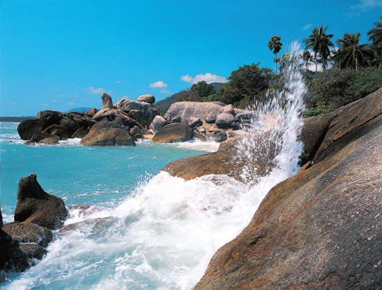 Waves breaking against a rocky outcrop on a deserted section of the southern - photo 16