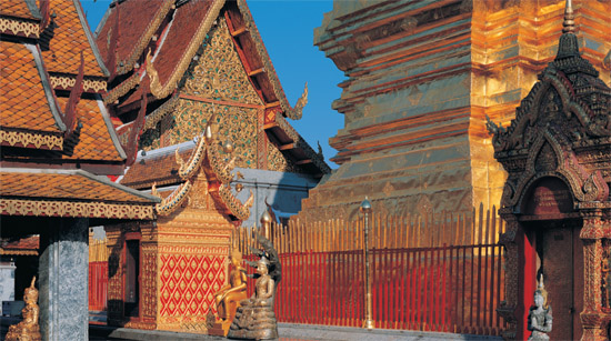 Part of the elaborate gilded stupa at Wat Prathat Doi Suthep symbol of Chiang - photo 17