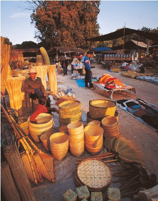 A display of baskets for sale at a local market Mahouts riding elephants - photo 9