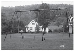 Bruce Moilanens boyhood home in Mass City is framed by swings in the schoolyard - photo 9