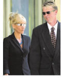 Karen Ellis and husband Stephen Ellis leave Melbournes County Court after she - photo 6