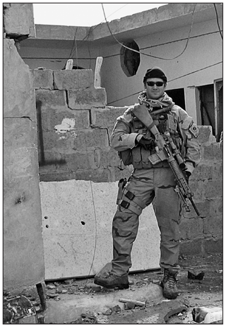 All kitted up with my Mk-12 sniper rifle the gun I was carrying when I rescued - photo 8