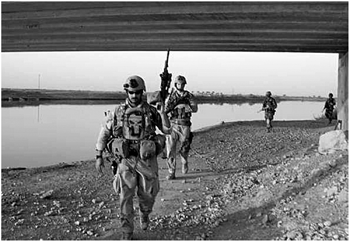 Marc Lee leading the platoon on patrol in Ramadi With the help of the Marines - photo 13