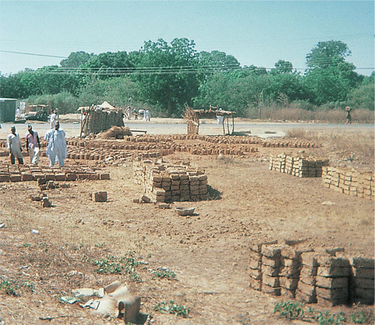 Making sun-dried bricks in Nigeria In making fired clay bricks the burning - photo 3