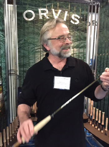 EDITOR JAY CASSELL INSPECTS AN ORVIS RECON FLY ROD AT THE 2015 FLY FISHING SHOW - photo 4