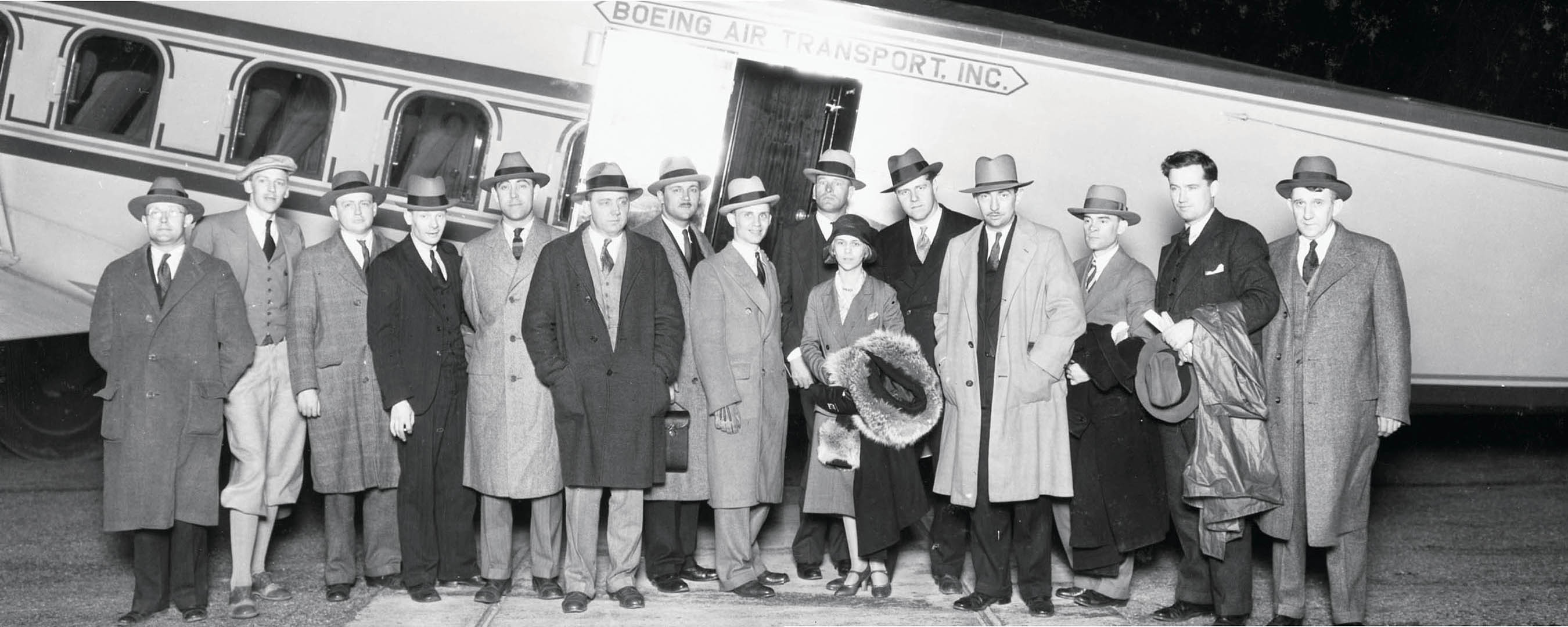 Passengers pose in front of the Model 80 built by Boeing Air Transport It was - photo 2