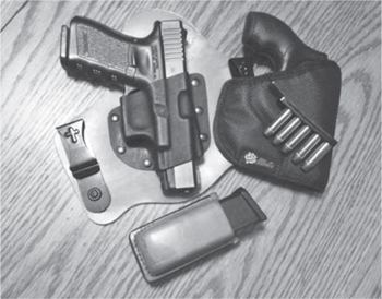 Author routinely carries two handguns off-duty this Glock 19 with a spare - photo 3